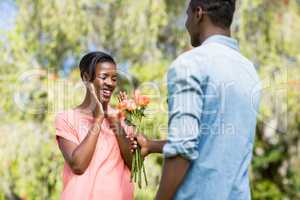 Happy woman having flowers