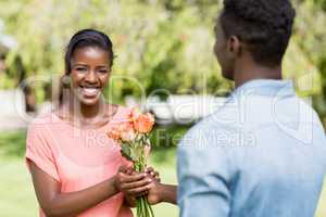 Happy woman having flowers