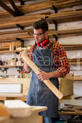 Carpenter working on his craft