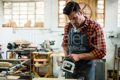 Carpenter working on his craft