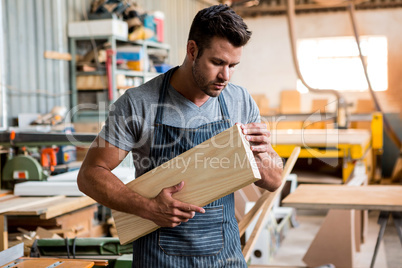 Carpenter working on his craft Carpenter working on his craft