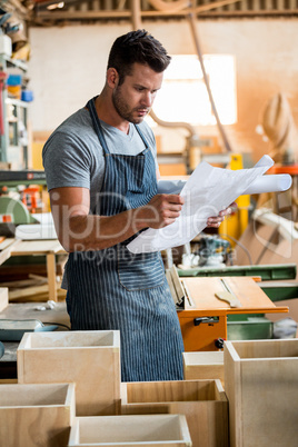 Carpenter working on his craft