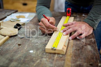 Carpenter working on his craft