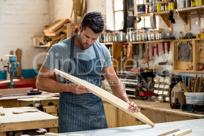 Carpenter working on his craft Carpenter working on his craft