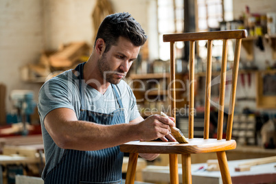 Carpenter working on his craft