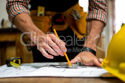 Carpenter working on his craft