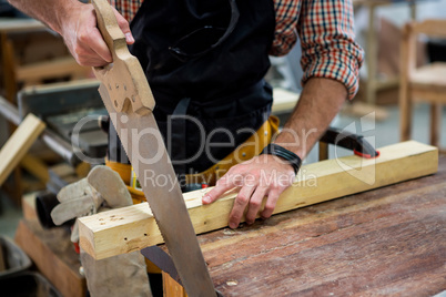 Carpenter working on his craft