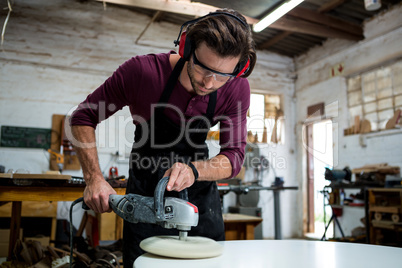 Carpenter working on his craft