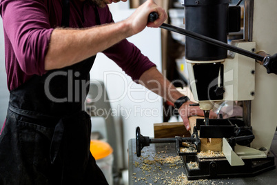 Carpenter working on his craft