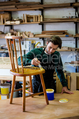 Carpenter working on his craft