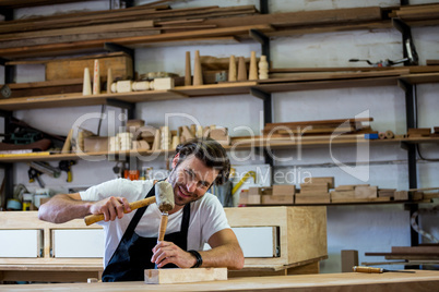 Carpenter working on his craft