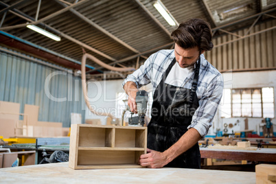 Carpenter working on his craft