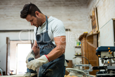 Carpenter working on his craft