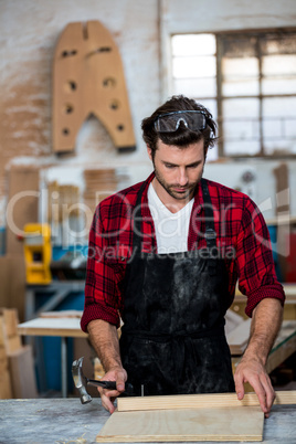 Carpenter working on his craft