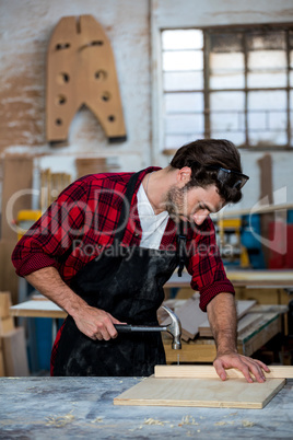 Carpenter working on his craft