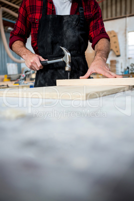 Carpenter working on his craft