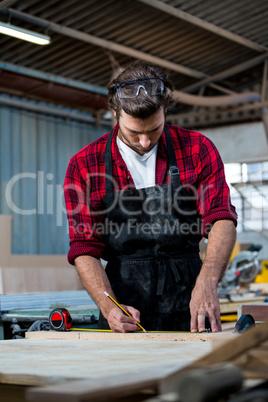 Carpenter working on his craft