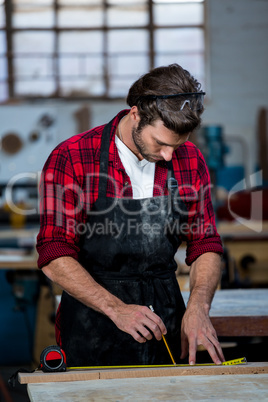 Carpenter working on his craft