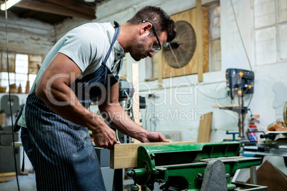 Carpenter working on his craft