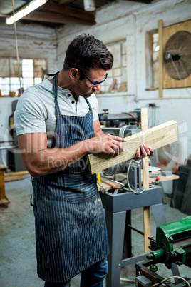 Carpenter working on his craft