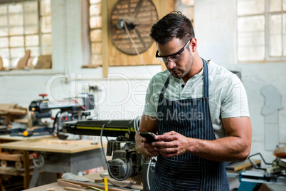 Carpenter using phone