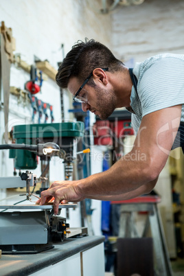 Portrait of a carpenter working on his craft