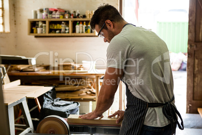 Carpenter working on his craft Carpenter working on his craft
