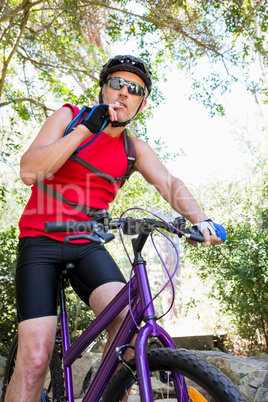 senior man is doing bicycle