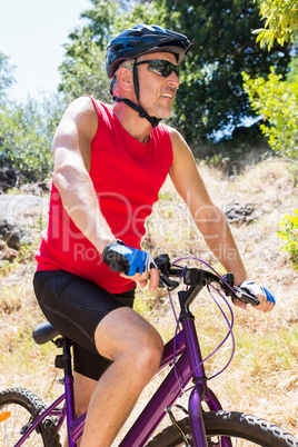 senior man is doing bicycle