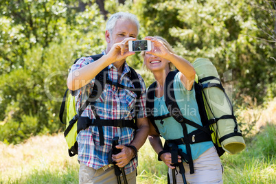 senior couple taking a picture