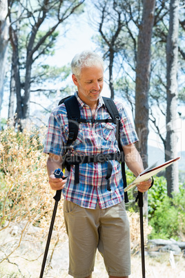 senior man looking the map