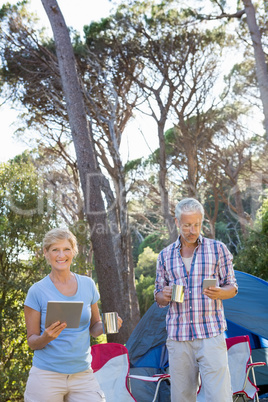 senior couple looking their technology object