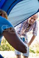 senior couple inside a tent