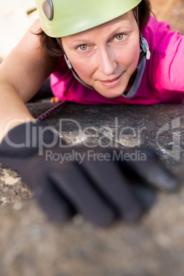 Woman rock climbing