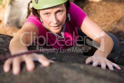 Woman rock climbing