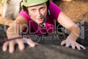 Woman rock climbing