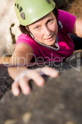 Woman rock climbing