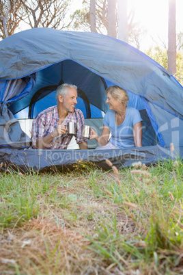 Mature couple sitting and looking each other