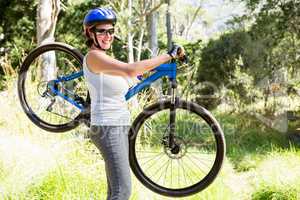 Woman taking her bike