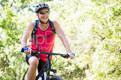 Mature man riding bike