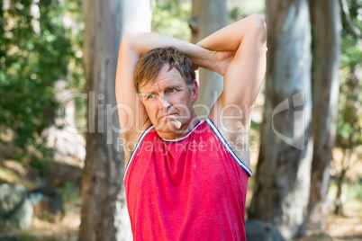 Man stretching his arms