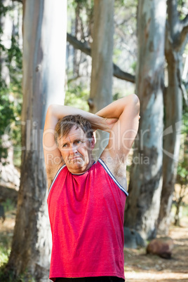 Man stretching his arms