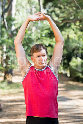 Man stretching his arms