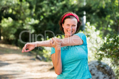 Woman stretching her arms