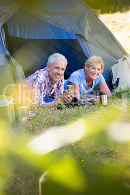 Mature couple laying and smiling