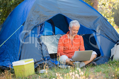 Mature man using computer