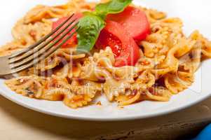 Italian pasta farfalle butterfly bow-tie and tomato sauce