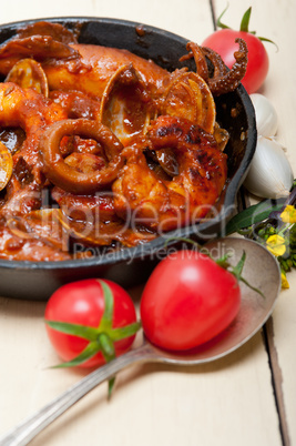 fresh seafoos stew on an iron skillet