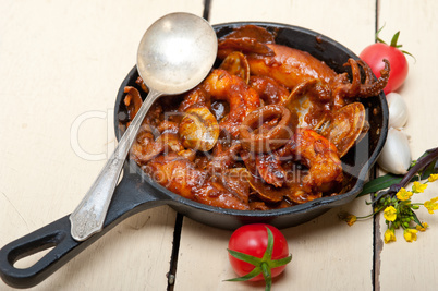 fresh seafoos stew on an iron skillet