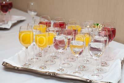 Red and yellow juice in tall glasses